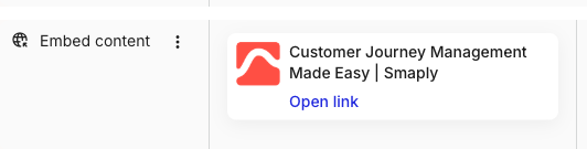 An embed card switched to Simple link display, showing a compact favicon, the page title, and an Open link link. The card sits in a lane labelled Embed content.
